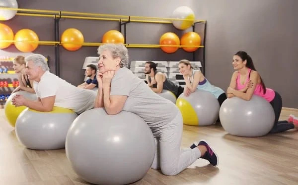 Elderly people pilates exercises studio